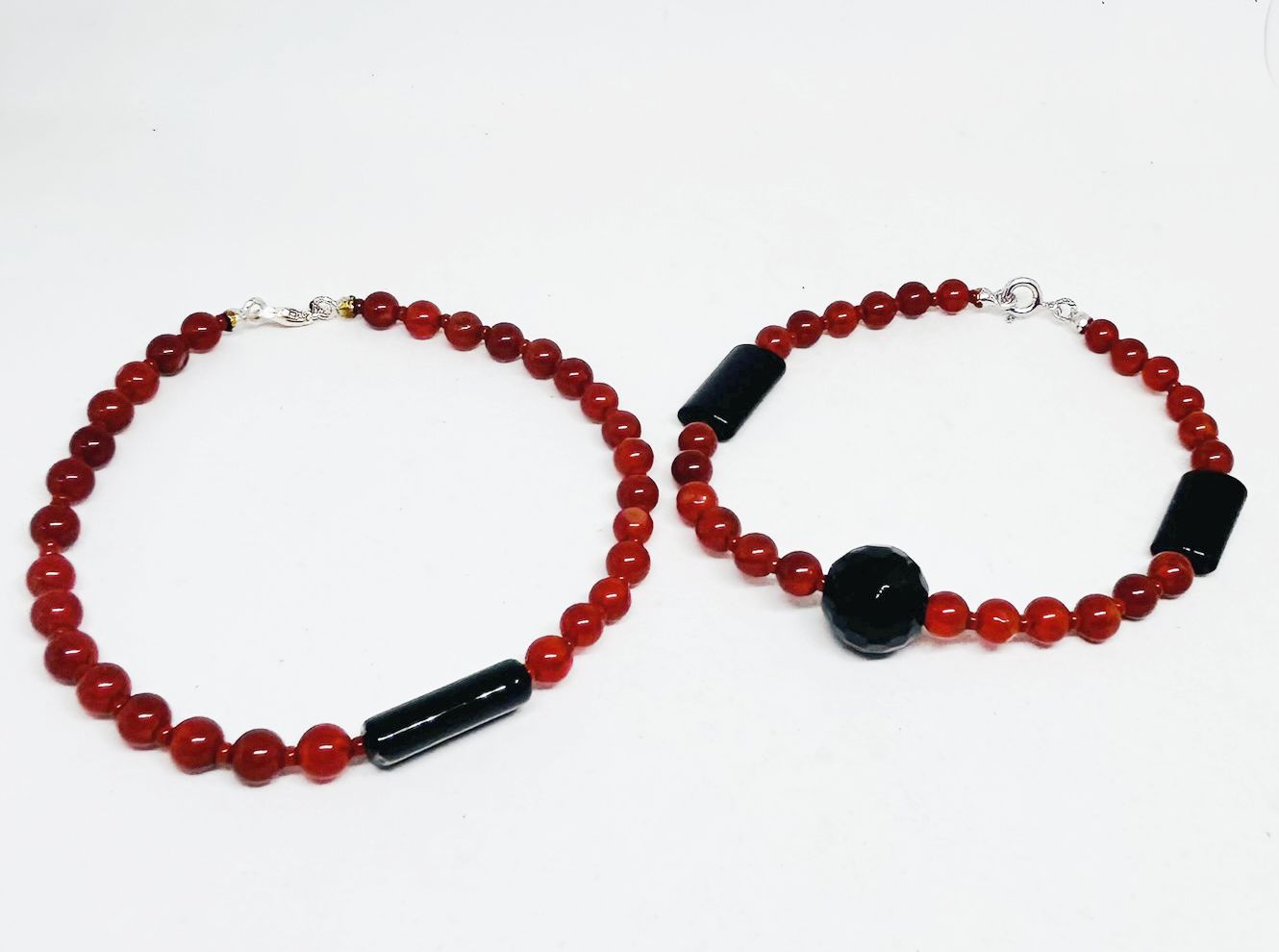 https://www.edengioielli.it/wp-content/uploads/2026/09/Bracciale-Argento-Onice-e-Corniola-12-eden-gioielli-.jpeg